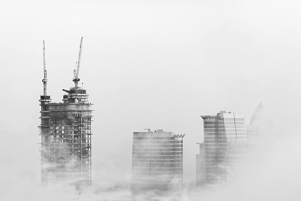 Cranes and skyscrapers under construction in Dubai