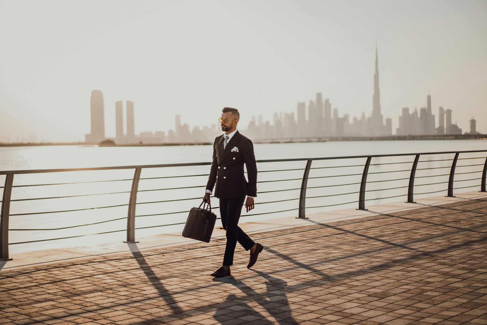 Man walking front of Dubai Marina
